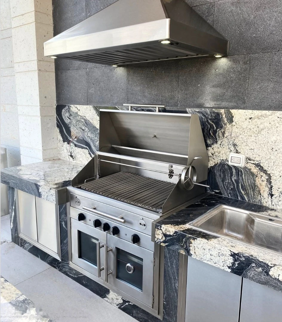 Cocina de exterior Prime Grills MX con asador integrado, acero inoxidable y cubierta de granito